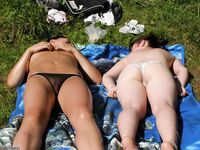 Two amateur GFs sunbathing topless 6