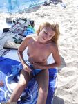 Heather sunbathing topless