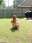 Blonde amateur wife posing outdoors 2