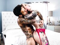 Inked Slut In Fishnet Stockings Gets Fucked Hard In Bed photos (Baby Sid)