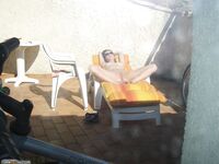 sunbathing with dildo